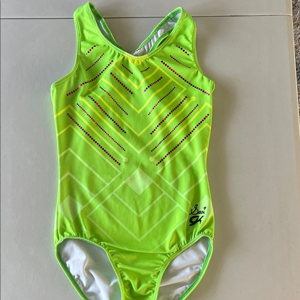 GK Green leotard with pink sparkle design by Suni Lee